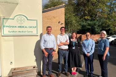 MP Callum Miller and the team at Eynsham Medical Practice - a group of people standing outside a GP surgery - Photographer Eynsham Medical Practice